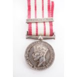 A miniature Naval General Service Medal with Palestine Clasp