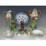 Oriental ceramics including Japanese porcelain teaware, Chinese temple lions and a Chinese carved