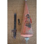 A vintage Minimax fire extinguisher and wall bracket