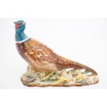 A Beswick pheasant, 18.5 cm x 14 cm high