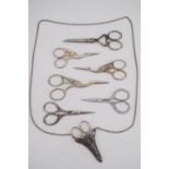 Several sets of novelty bird-form needlework scissors, others and a pewter scissors case