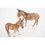 Two Beswick donkeys