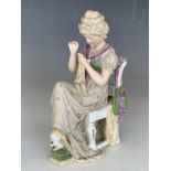 A late 19th Century German bisque porcelain figurine modelled as an early 19th Century lady sat