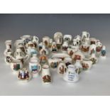 A large collection of Goss and other crested china