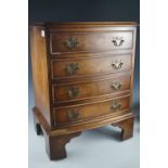 An old reproduction Georgian style bow-fronted walnut bedside chest, ex Chapman's Siesta House, 60