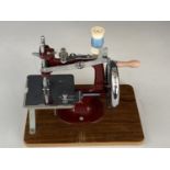 A vintage Essex miniature sewing machine, circa 1950s