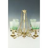 A gilt metal four-branch electrolier / chandelier, having etched achromatizing green glass shades,