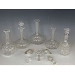 Four Victorian cut glass shaft-and-globe decanters, one other Victorian decanter and several