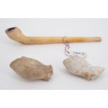 Two 16th / 17th Century clay pipe bowls and a pipe