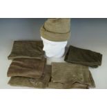 A number of Second World War dated British Army Commando-issue cap comforters