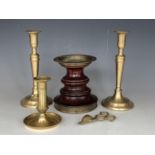 A pair of Georgian style brass candlesticks, one other slide eject example, candle snuffers and a