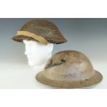 Two Second World War British army helmets (a/f)