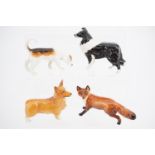 A Beswick Border collie, fox hound, corgi and fox, (fox a/f)