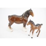 A Beswick 818 Shire Horse and a Beswick foal