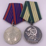 A Soviet Medal for a Veteran of the Armed Forces of the USSR, together with a Jubilee Medal for 50