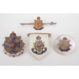 Four various Border Regiment sweetheart brooches