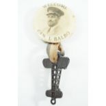 A 1930s aviation pin badge comprising a button badge bearing a photographic portrait and legend "