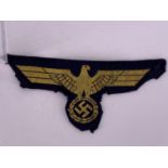 A German Third Reich Kriegsmarine BeVo breast badge