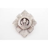 A Scots Guards white metal sweetheart brooch, stamped silver and tested as such