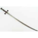 A 17th Century pillow sword, having a slender curved single-edged blade, the hilt having a an