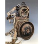 A Great War Belgian gas mask and can