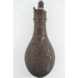 A Victorian Hawksley copper and brass powder flask, the bag shaped body relief-decorated in a