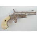 A Colt 3rd model Derringer pistol bearing an engraved presentation inscription to R Wymer, 91st