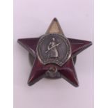 A Soviet Order of the Red Star, numbered 2027244