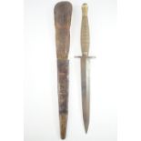 A Second World War British army issue Fairbairn Sykes / FS fighting knife, having a "ribbed-and-