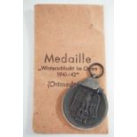 A German Third Reich Eastern Front Medal in issue packet