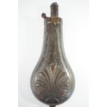 A Victorian brass powder flask, the bag shaped body decorated in an anthemion pattern, 19 cm
