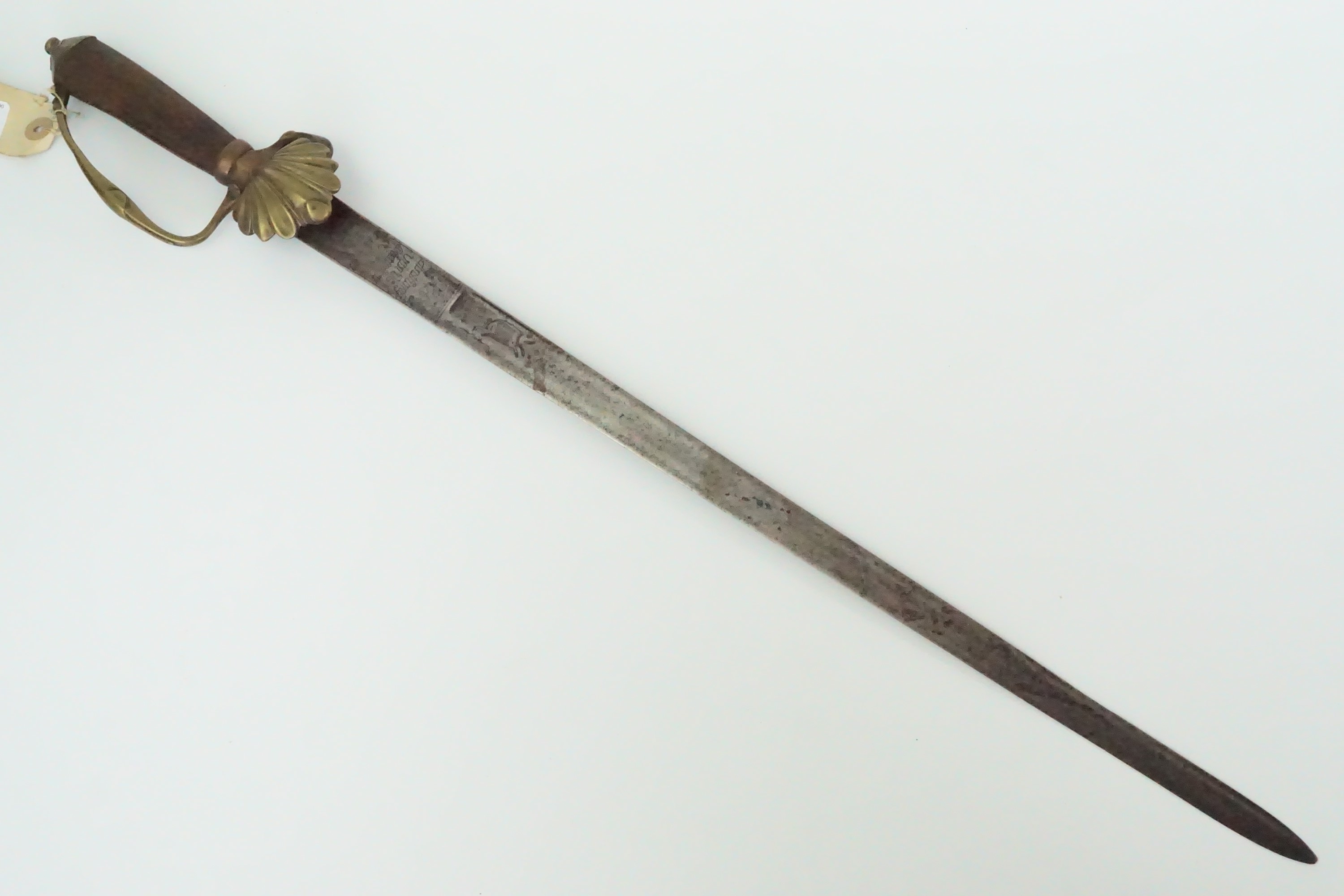 An early 18th Century Dutch hunting sword, having a tapering single-edged blade with broad fuller