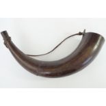 An 18th / 19th Century powder horn, 32 cm