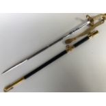 A US Navy officer's sword retailed by Hilborn-Hambuger Inc of New York, in original transit case,