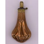 A Victorian Dixon's patent copper and brass powder flask, the body decorated with broad flutes and