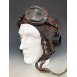 A Second World War RAF C-Type flying helmet together with a pair of Mk VIII flying goggles