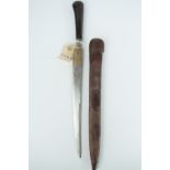 A fine 17th Century hunting knife, the subtly curved blade bearing parcel-gilt etched panels