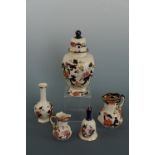 Five items of Mason's Mandalay china including lidded a jar (24 cm high) two jugs, a bell and bud