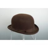 A vintage Christys' brown bowler hat