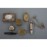 Collectors' items comprising a "The Metropolitan" Beaufort whistle and chain, a travelling ink well,