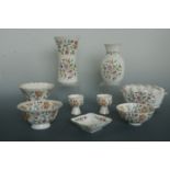 Nine items of the Minton Haddon Hall ware including vases, bowls etc.