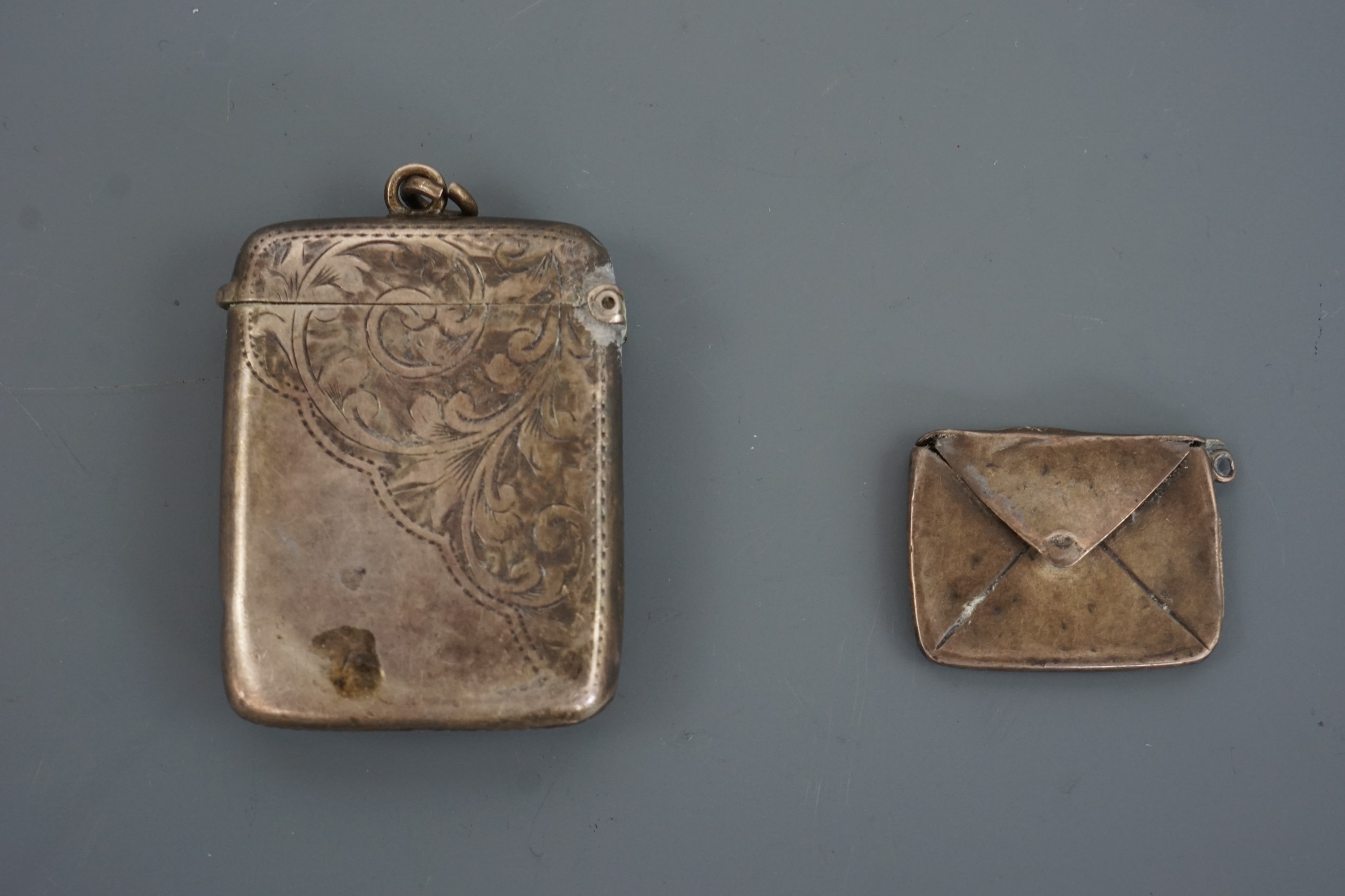 An Edwardian silver watch chain fob Vesta case together with a silver stamp case