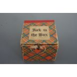 A vintage toy "Jock in the Box" jack in the box, circa 1950s, 9 cm x 9 cm x 7 cm