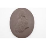 An antique Wedgwood type black basalt relief portrait plaque of Admiral Lord Nelson, 9 cm x 7 cm