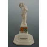 A Carlisle crested china statue of Lloyd George, Carnavon, 15 cm high