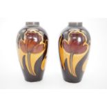 A pair of early 20th Century silver-collared Art Nouveau earthenware oviform vases, 11 cm