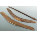Two Australian aborigine boomerangs and a nulla nulla