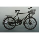 A wrought-metal miniature bicycle, 43 x 28 cm