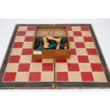 An early 20th Century Staunton type chess set, Kings 8 cm, together with a tooled-leather folding