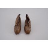 A pair of miniature clogs
